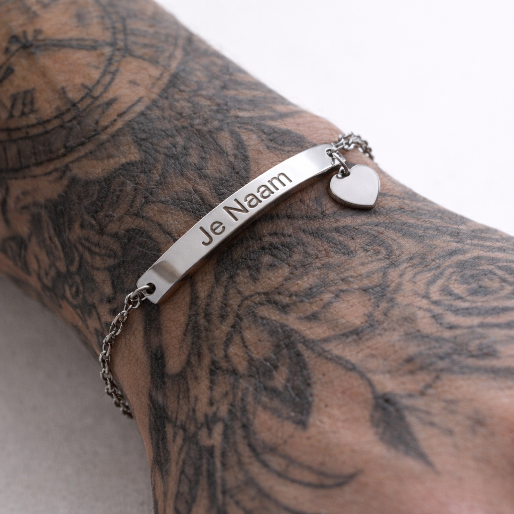 Gepersonaliseerde armband met naamgravure en hartbedel - zilverkleurig en verfijnd