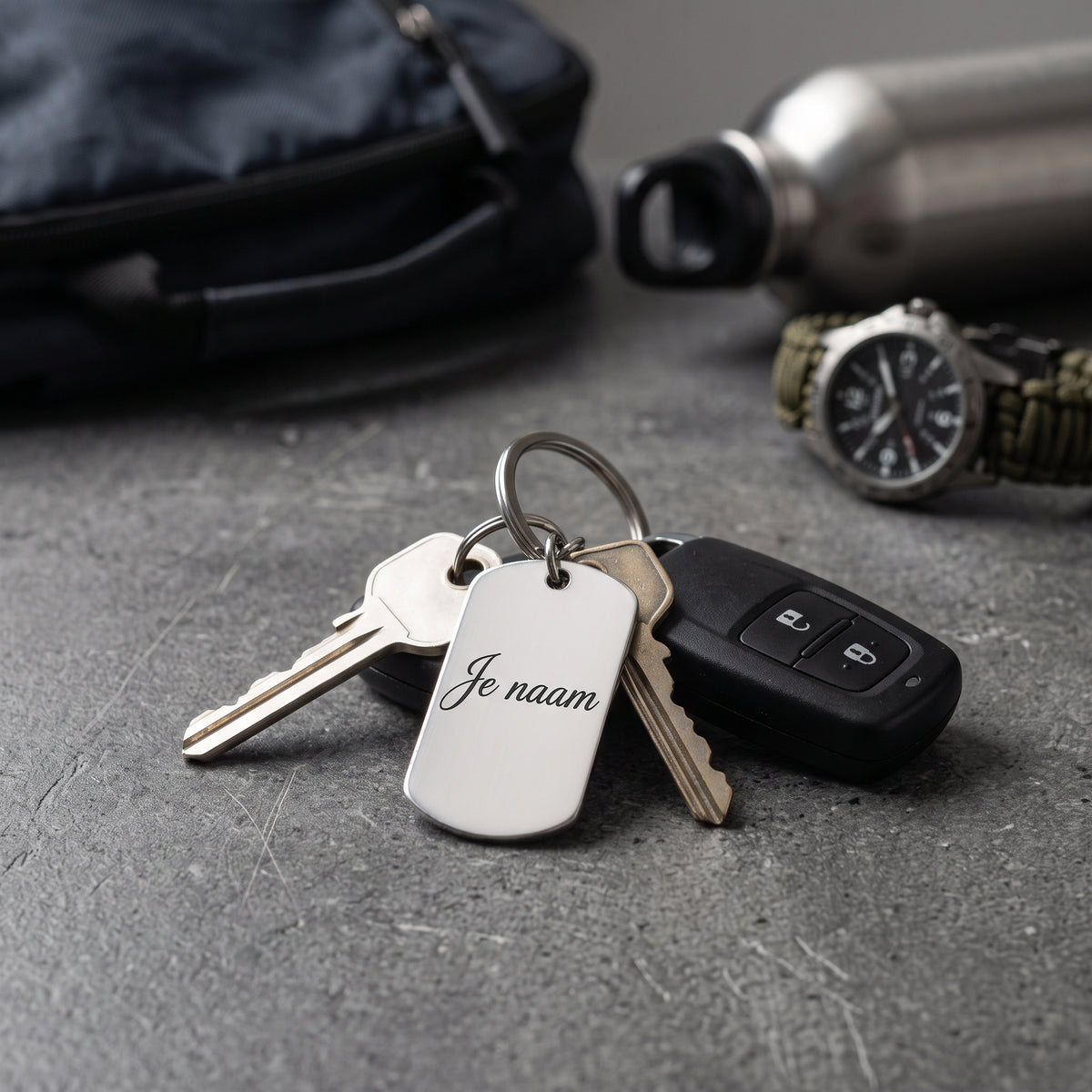 Sleutelhanger met Naam – Gepersonaliseerde Metalen Sleutelhanger – Gravure Naam of Tekst – Voor- en Achterkant – Zilverkleurig – 30 mm – Autosleutelhanger – Persoonlijk Cadeau