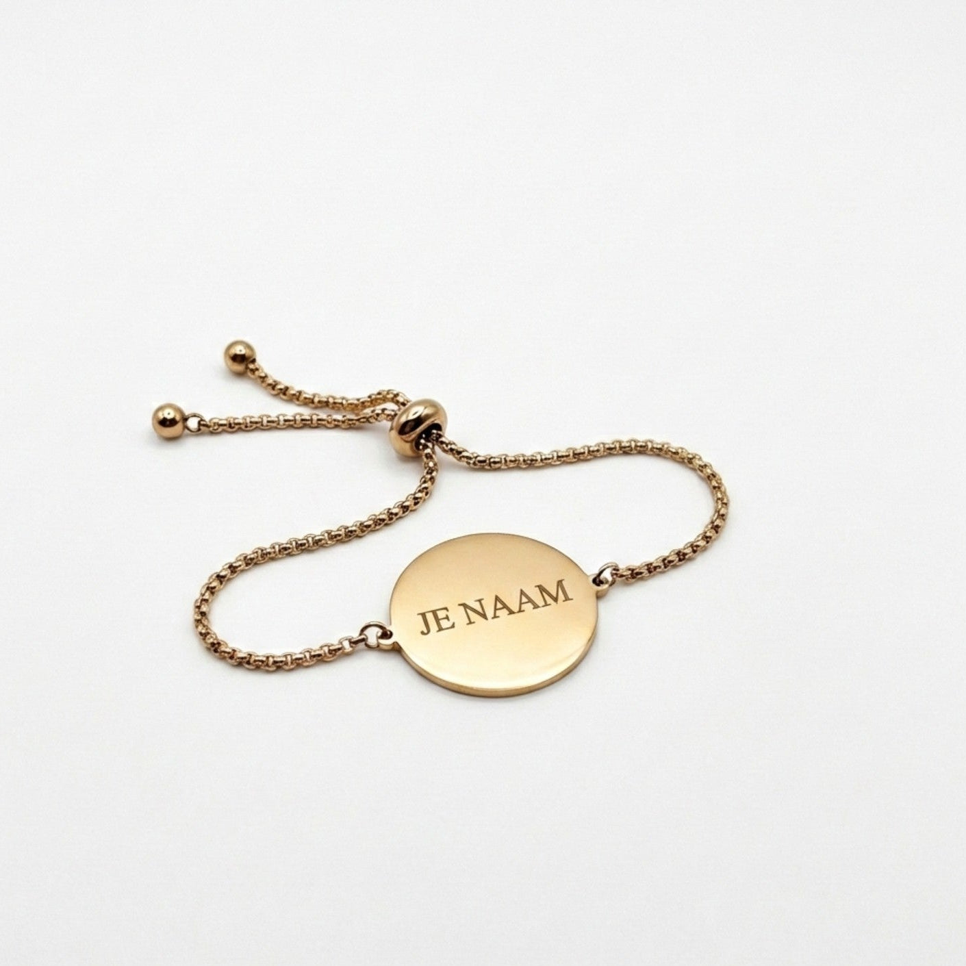 Armband met gravure goudkleurig - ronde hanger - verstelbaar - RVS